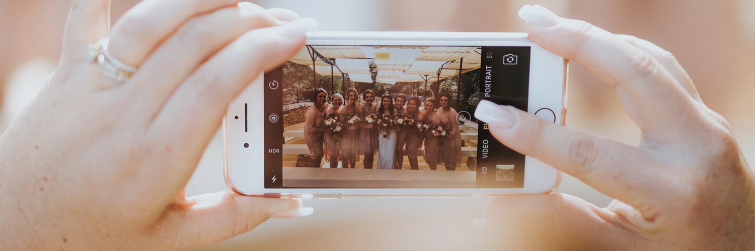 taking-wedding-party-photo-on-phone